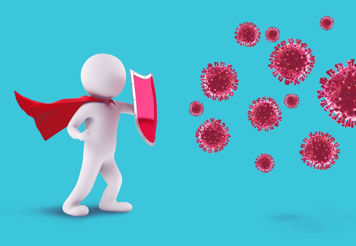 Illustration of a cartoonish person holding a shield defending itself from covid virus cells
